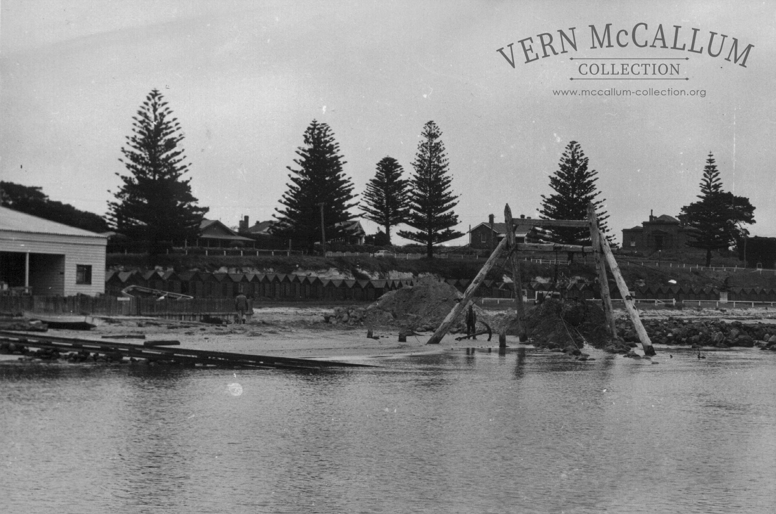 Construction of the boat slip for Ron Stewart's (the boat builder) jetty, Portland.