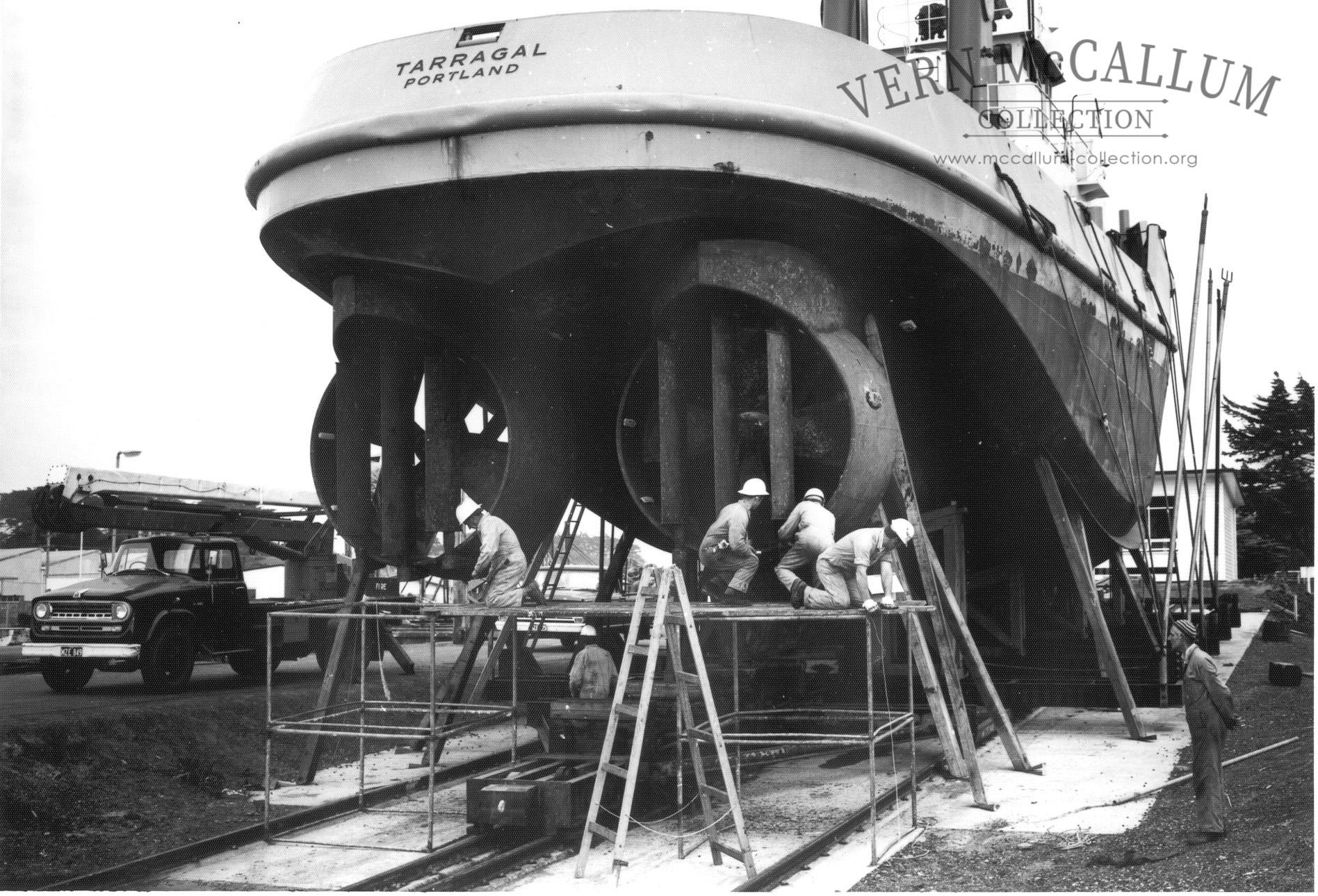 Left to Right:  Reg Pitts, Ken Whistler, John Matuschka, Alan Guthrie,
Unknown, working on the 'Tarrigal" tug boat on the 300 ton slip.
