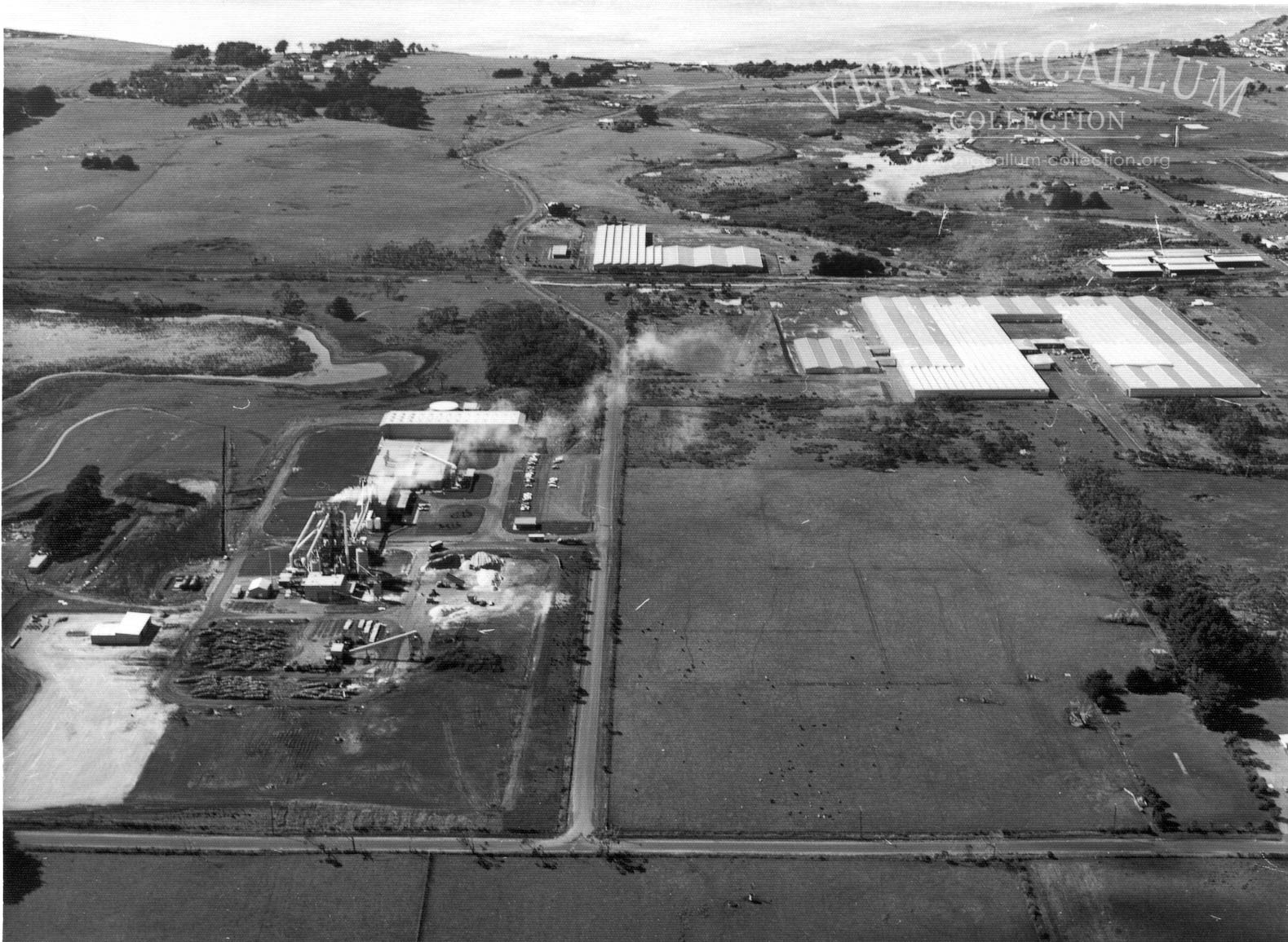 At Darts road C.S.R. chip board works and the woolstores. The intersection of Darts road and North Portland School road can be seen in the bottom of the photo.
