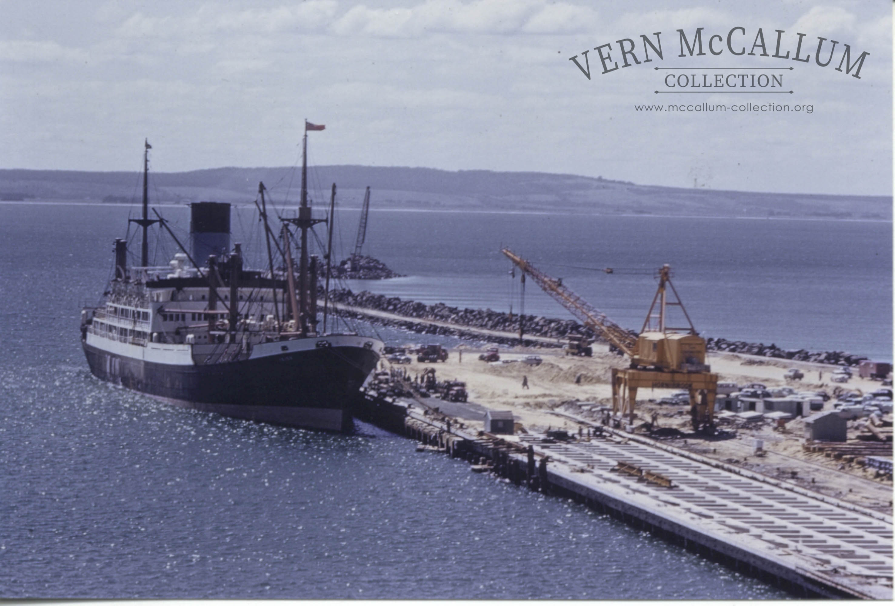 The first ship to use the partly constructed wharf. A large Generator that was transported to the Paper mill at Millicent.