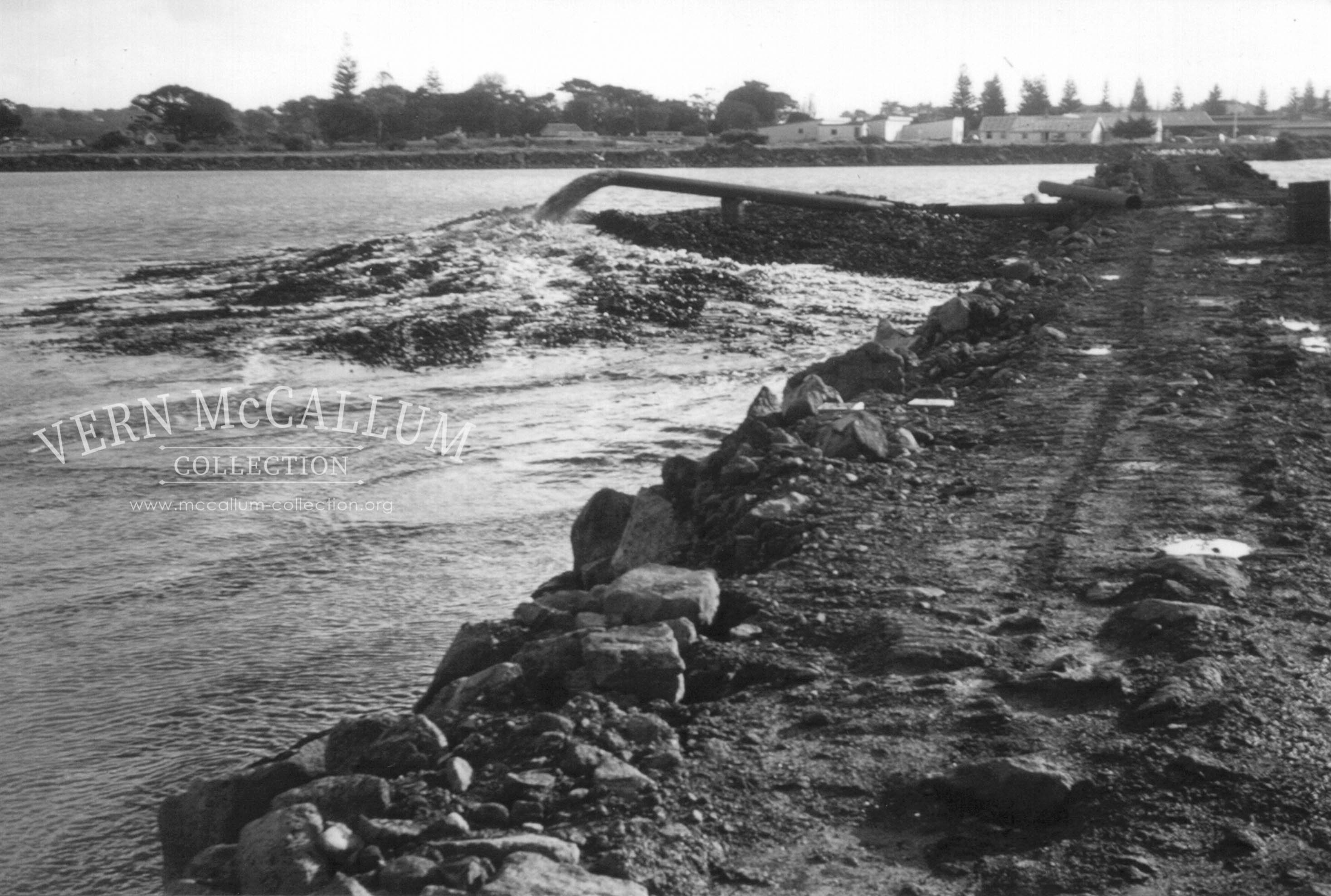 Jorgens dredge pumping sand and rubble for reclamation works.
