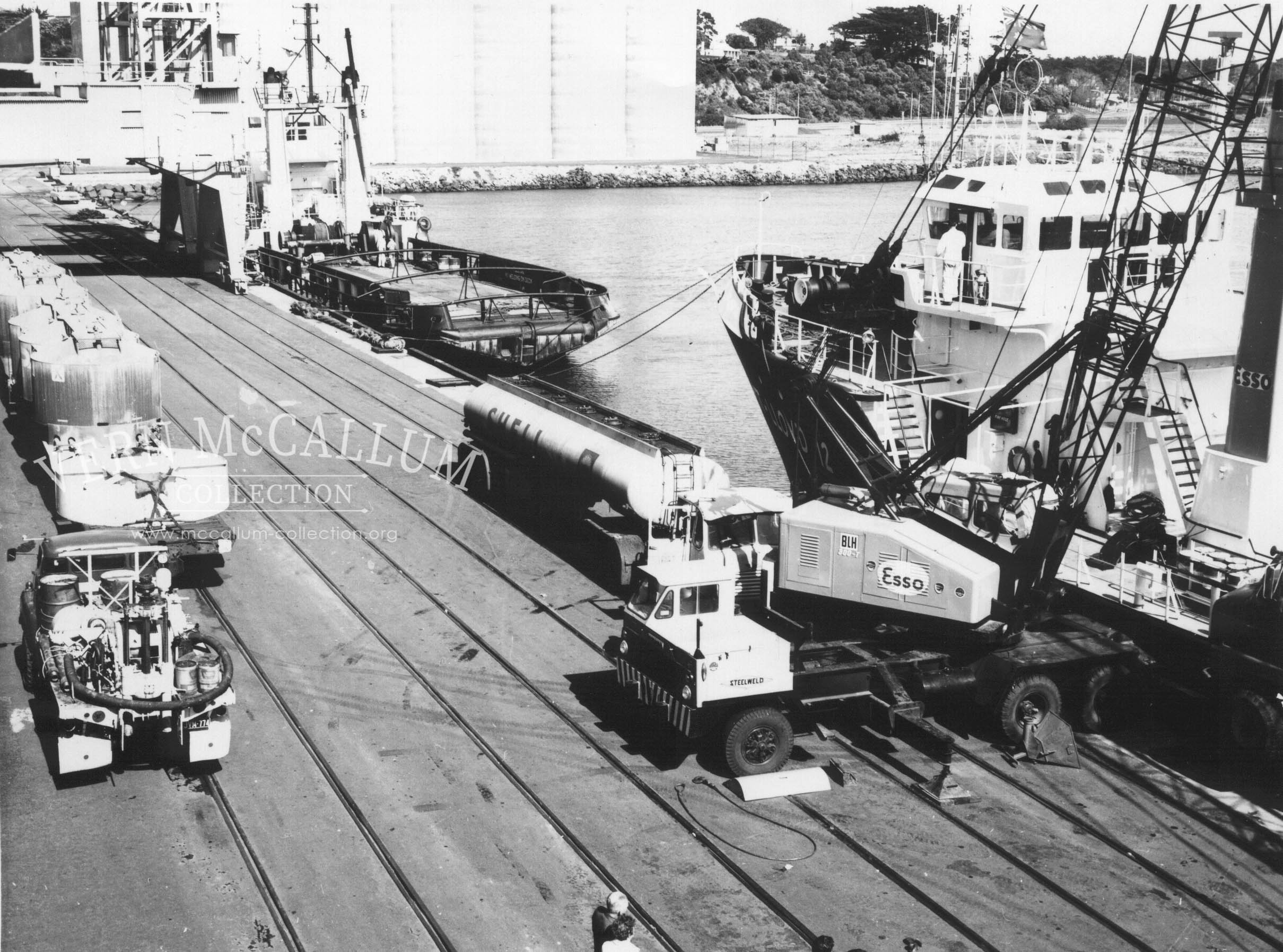 Oil rig tender boats being refuelled and loaded at the K S Anderson wharf.