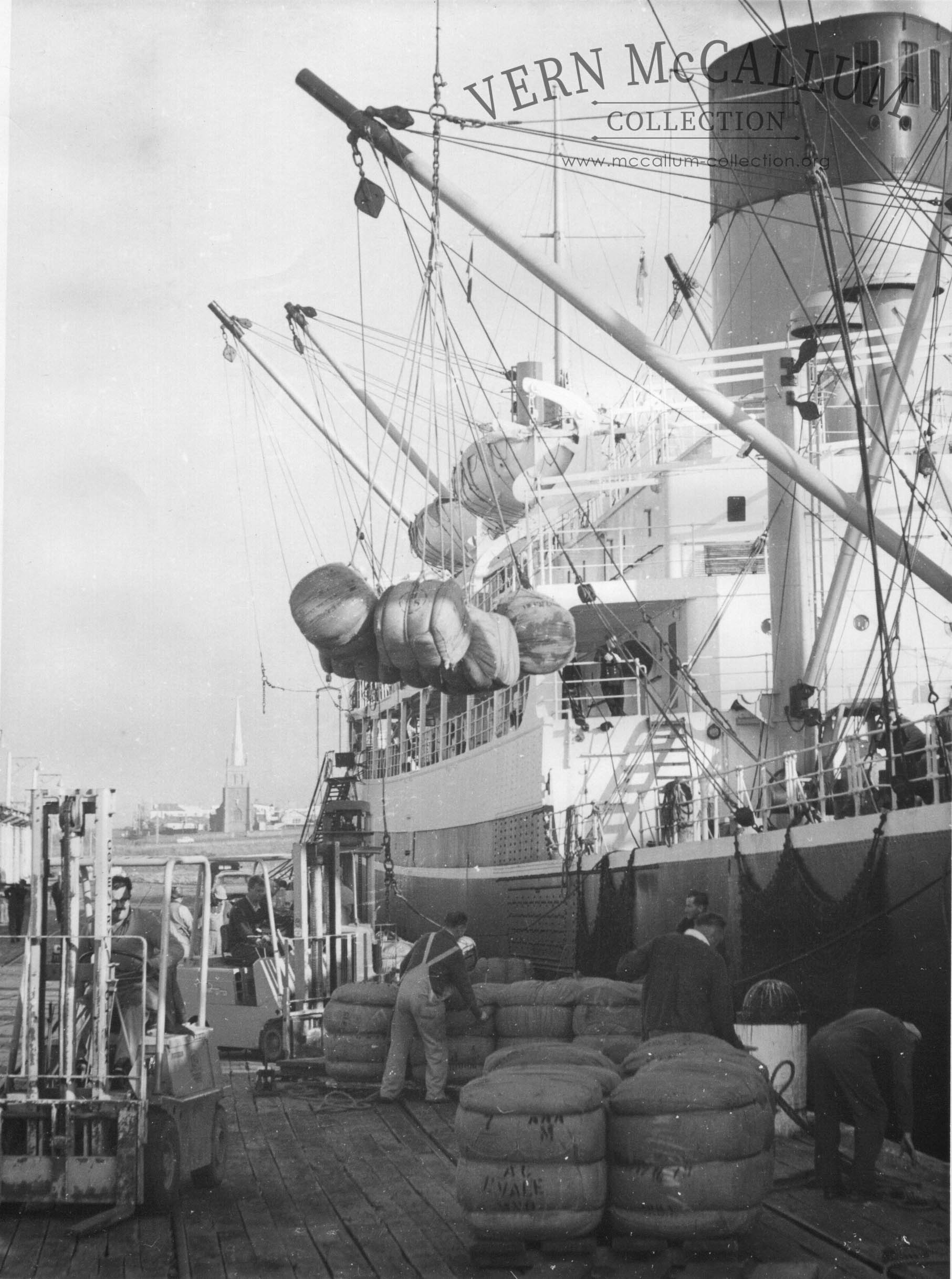 Loading wool at old ocean pier.