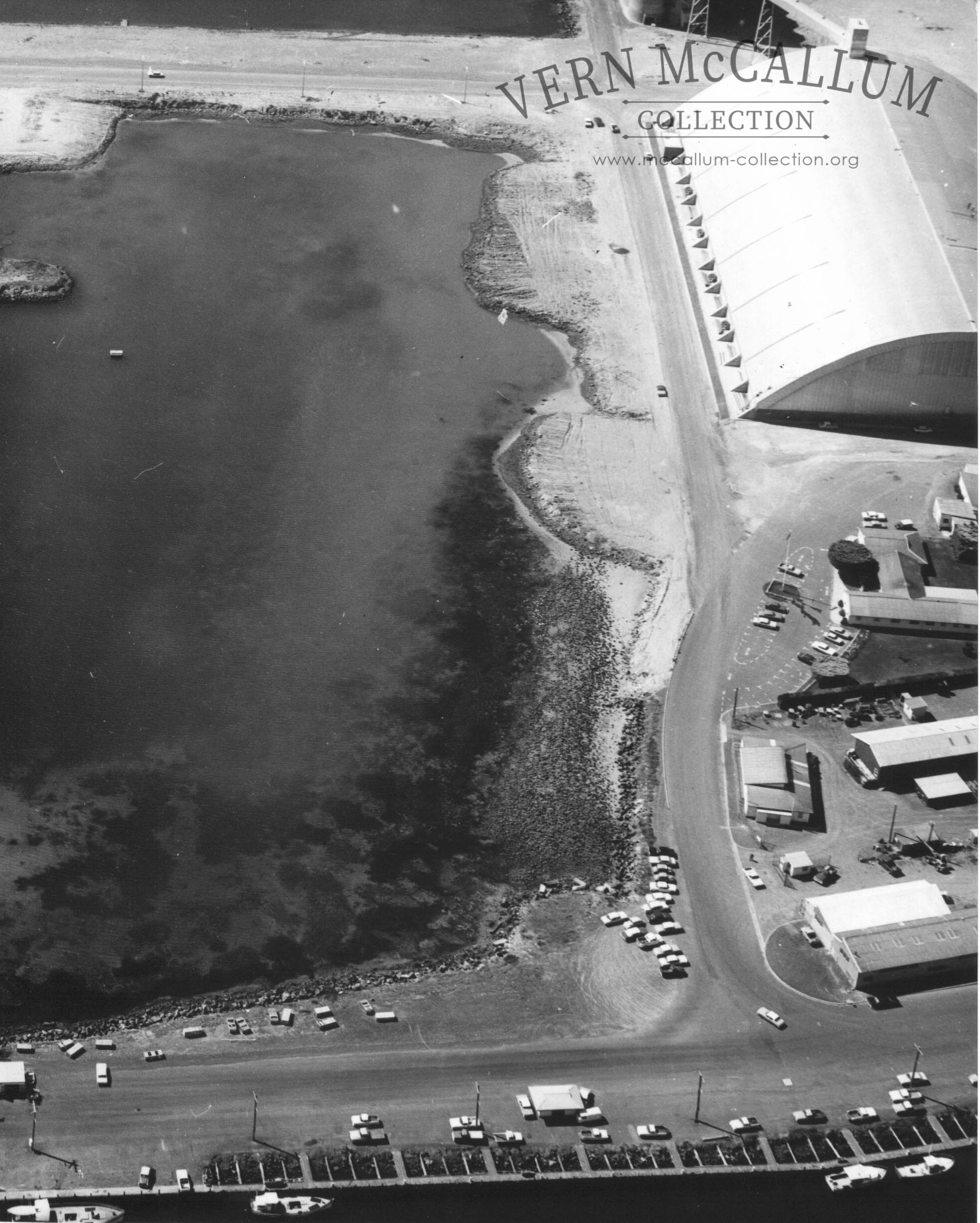 Aerial photo of Portland Harbour Trust Offices and horzontal wheat shed.