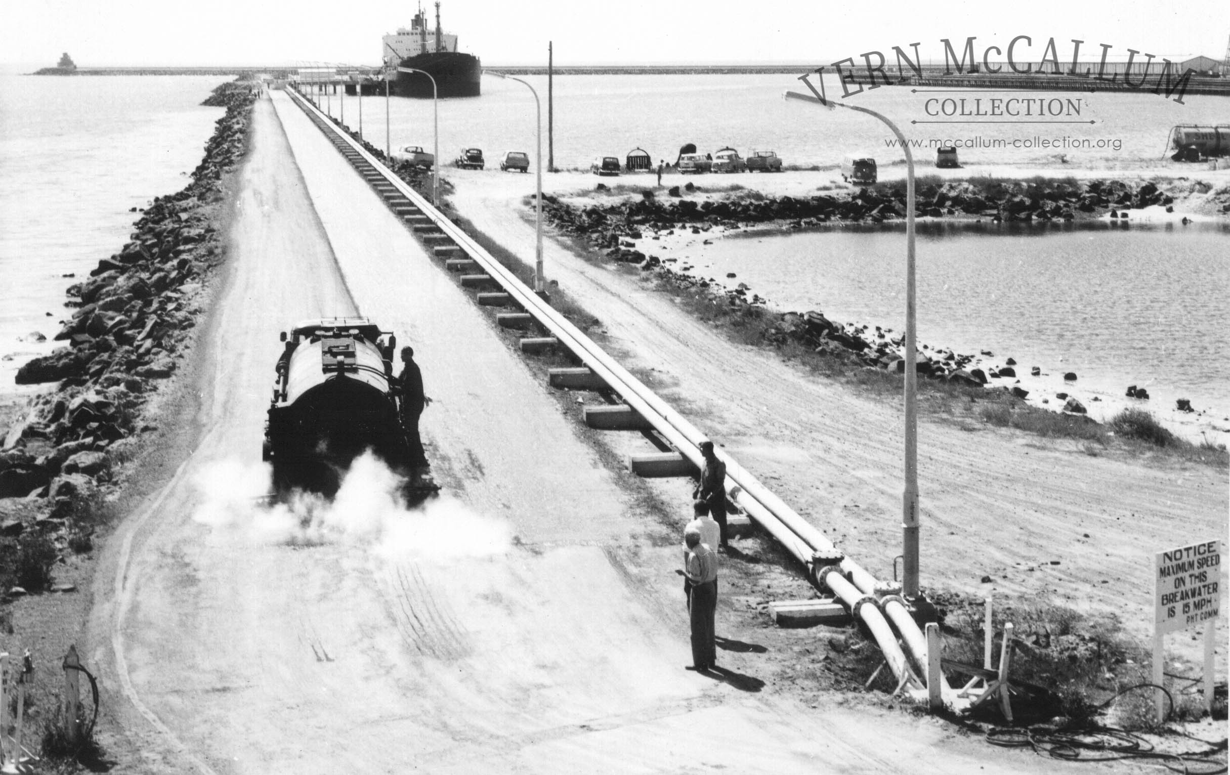 Sealing the oil wharf.(lee breakwater)