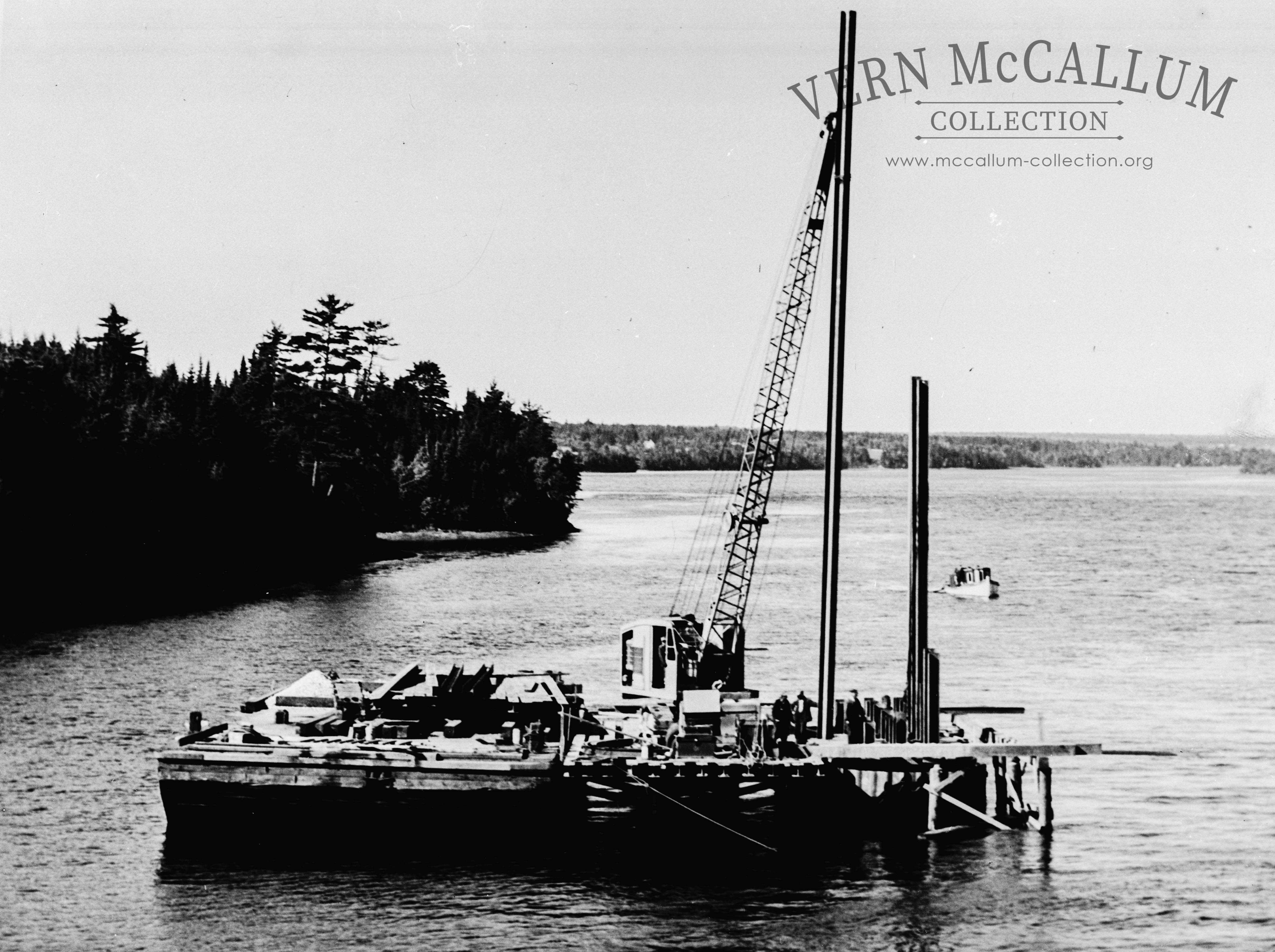Driving piles at an unknown location this glass neg was from the port of portland collection