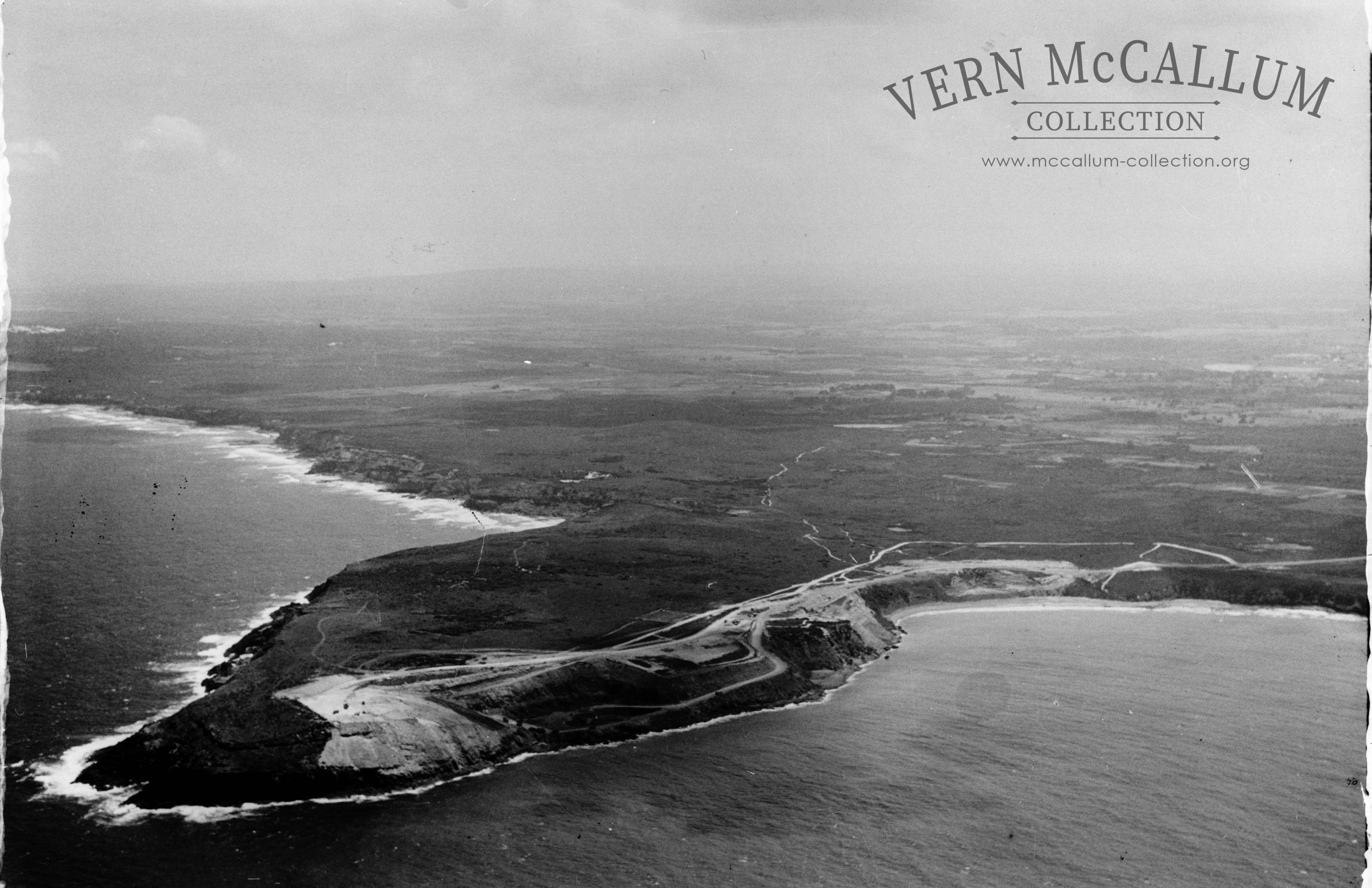 An aerial view of  the Cape Grant Quarry where all of the rock for the building of the Port of Portland  was  quarried, circa 1950.
This was done from a glass negative.
