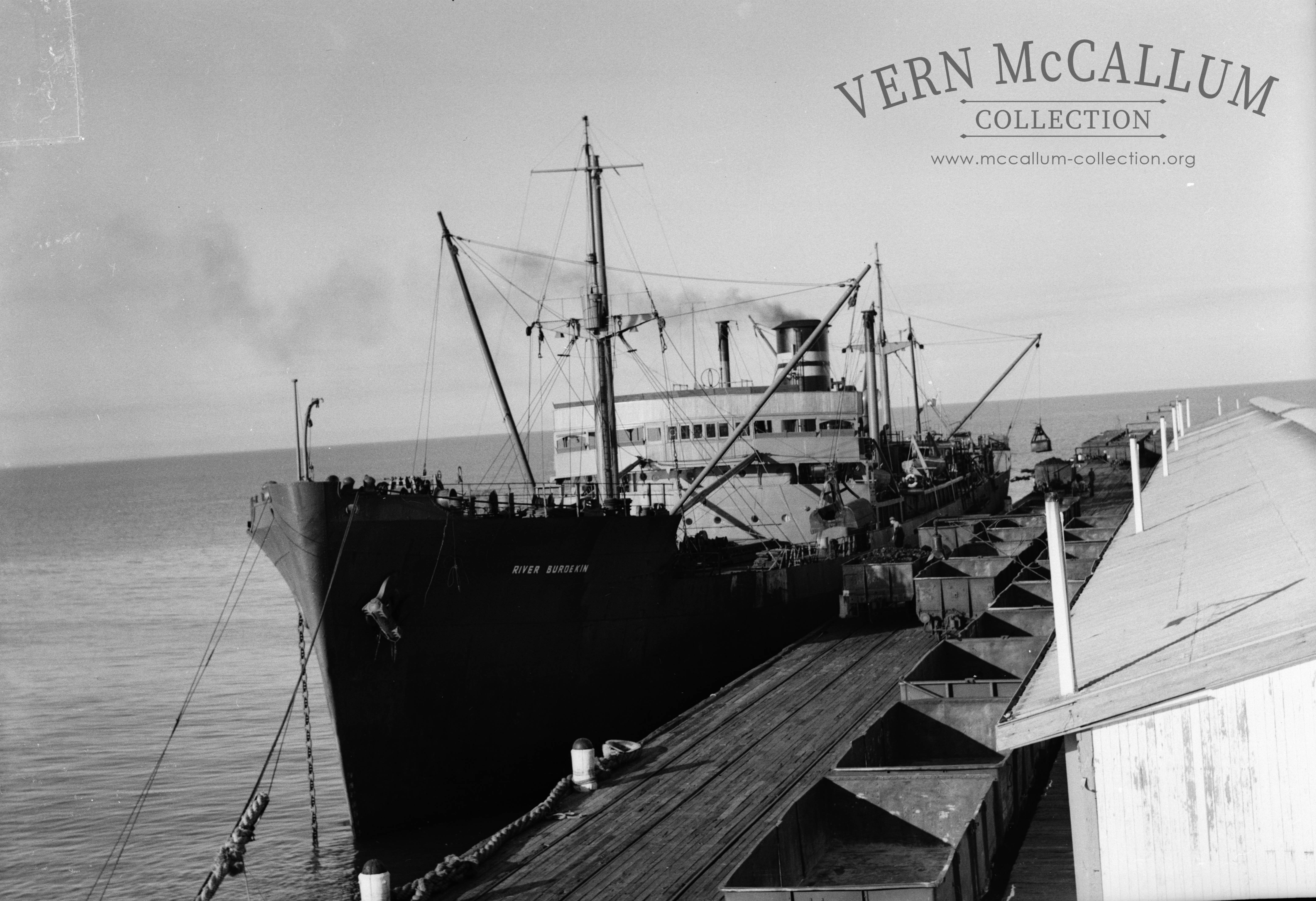 The" River Burdekin" unloading coal on the Ocean pier.