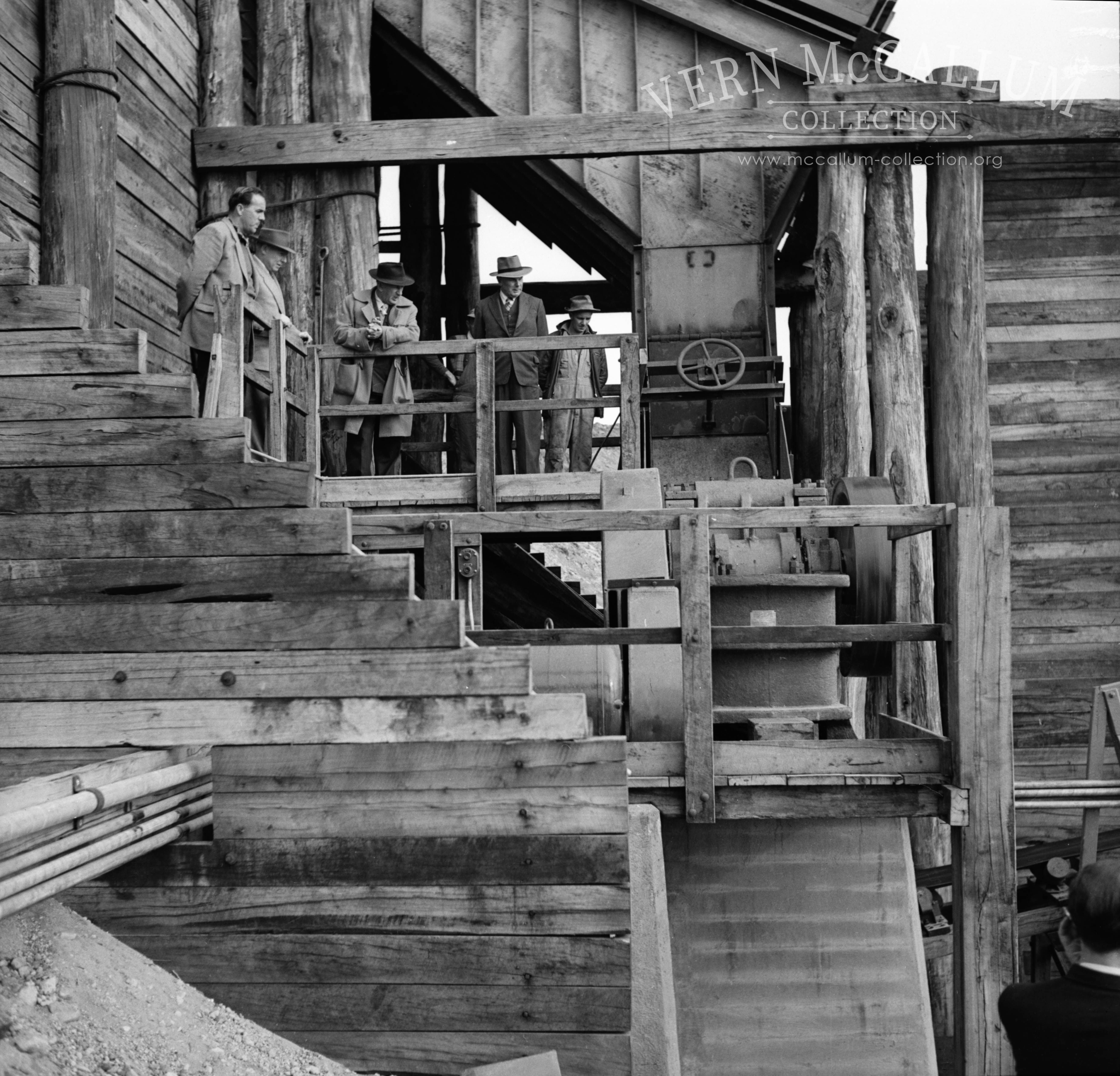 The crushing plant at Cape Grant as new
left to right .: ___________ .Pat Hughes ----------,K S Anderson ,Dick Chandler.