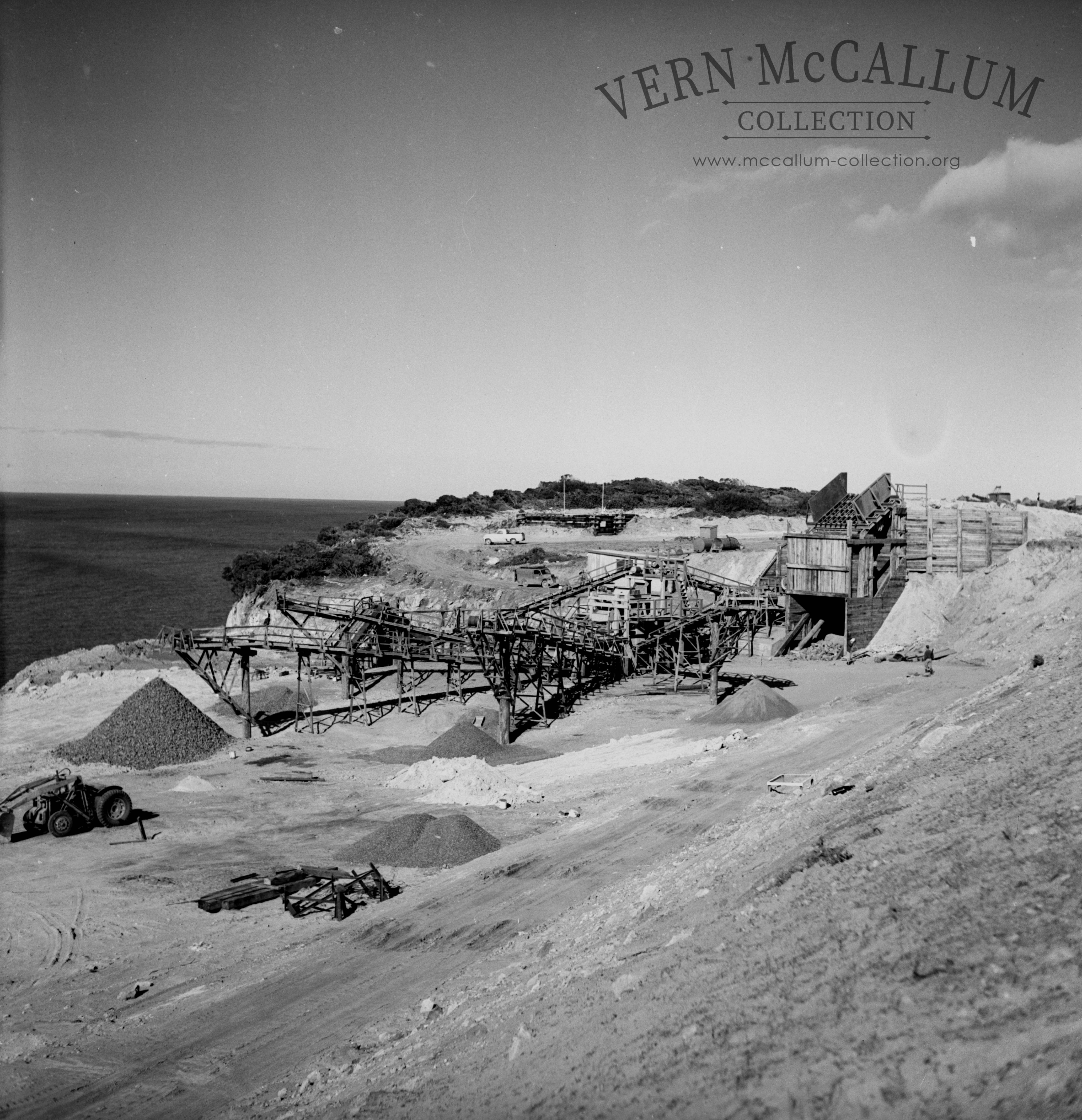 The crushing plant complete the magazine for the explosives can be seen behind the utility.