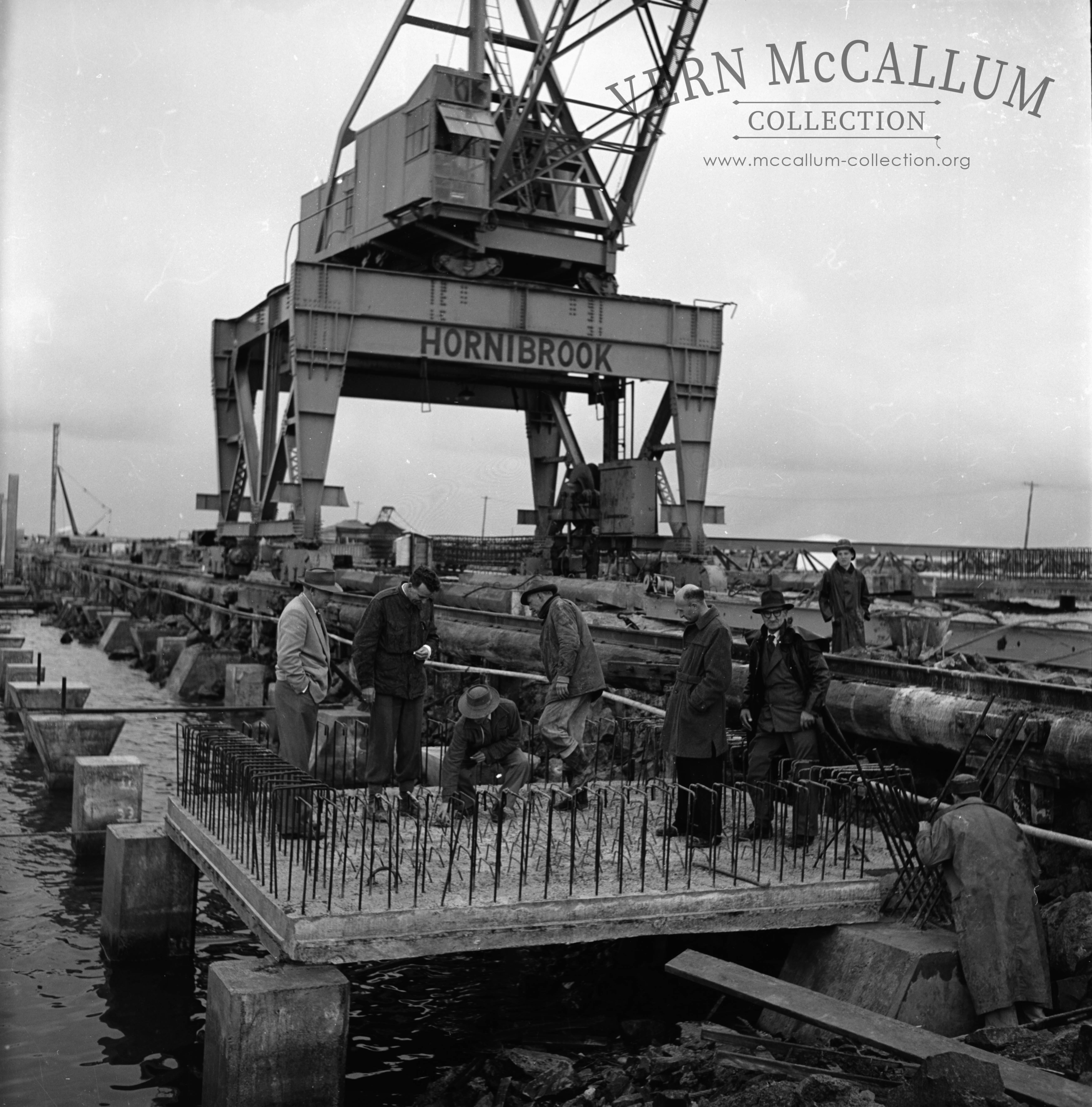 The first deck slab being laid on the K S Anderson wharf.
Left to right : 1 Pat Hughes 2___________,3-----------4----------5Steven Sander
6----------7---------8,