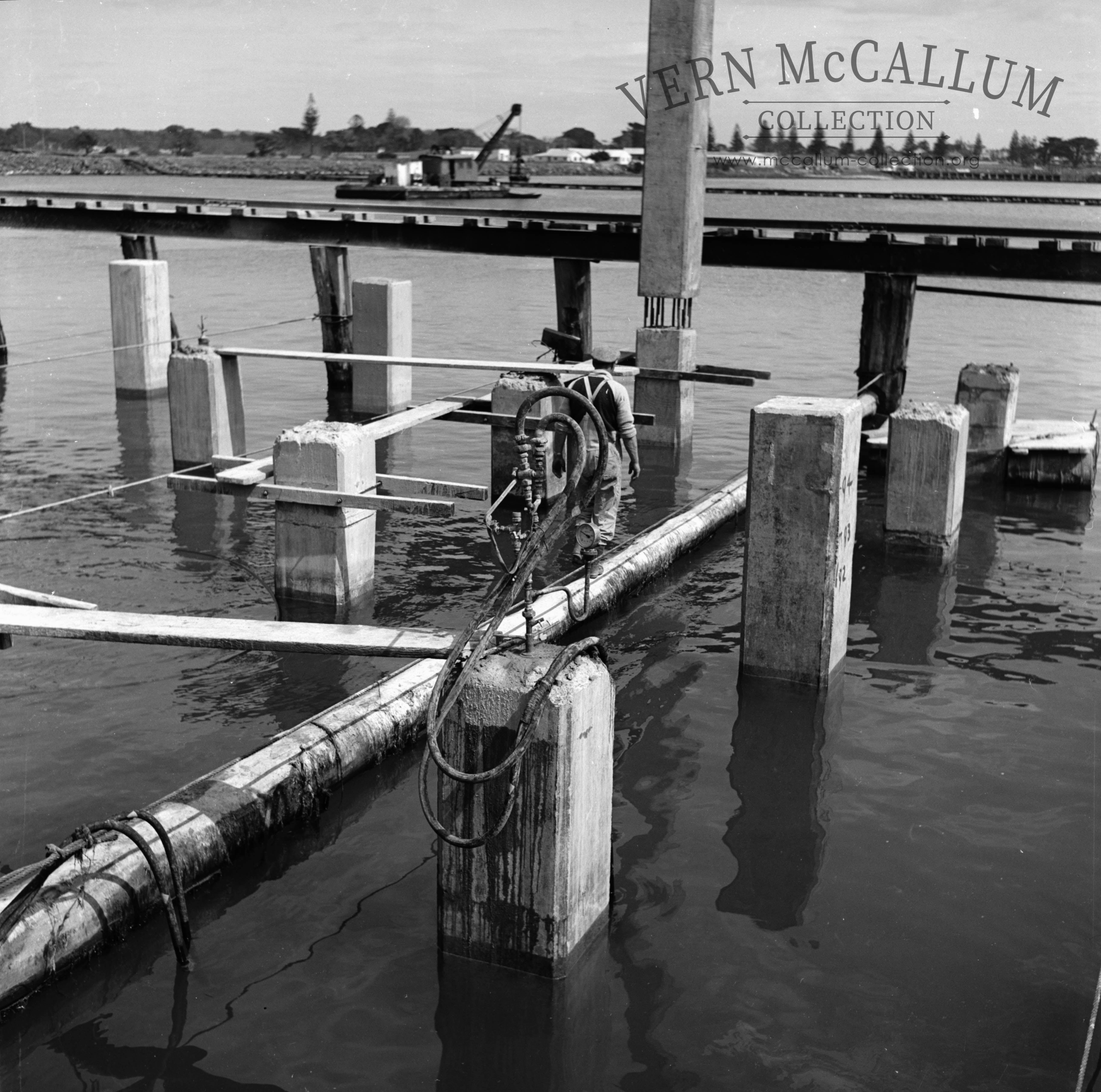 Note the pile right of the worker has been spliced ready to be boxed and poured to join the two together ready for driving deeper into the sea floor.