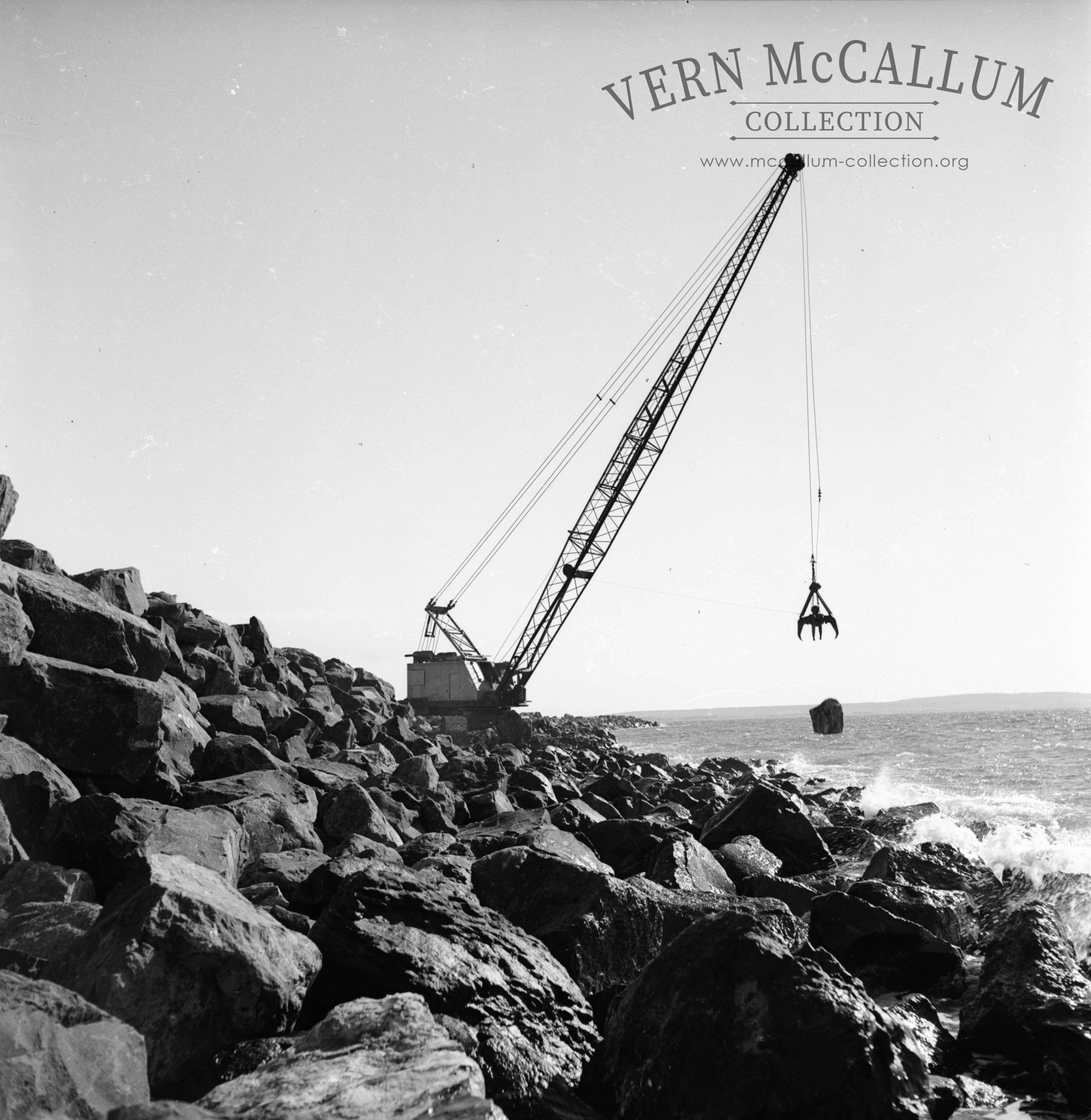 Placing stone on the main breakwater.