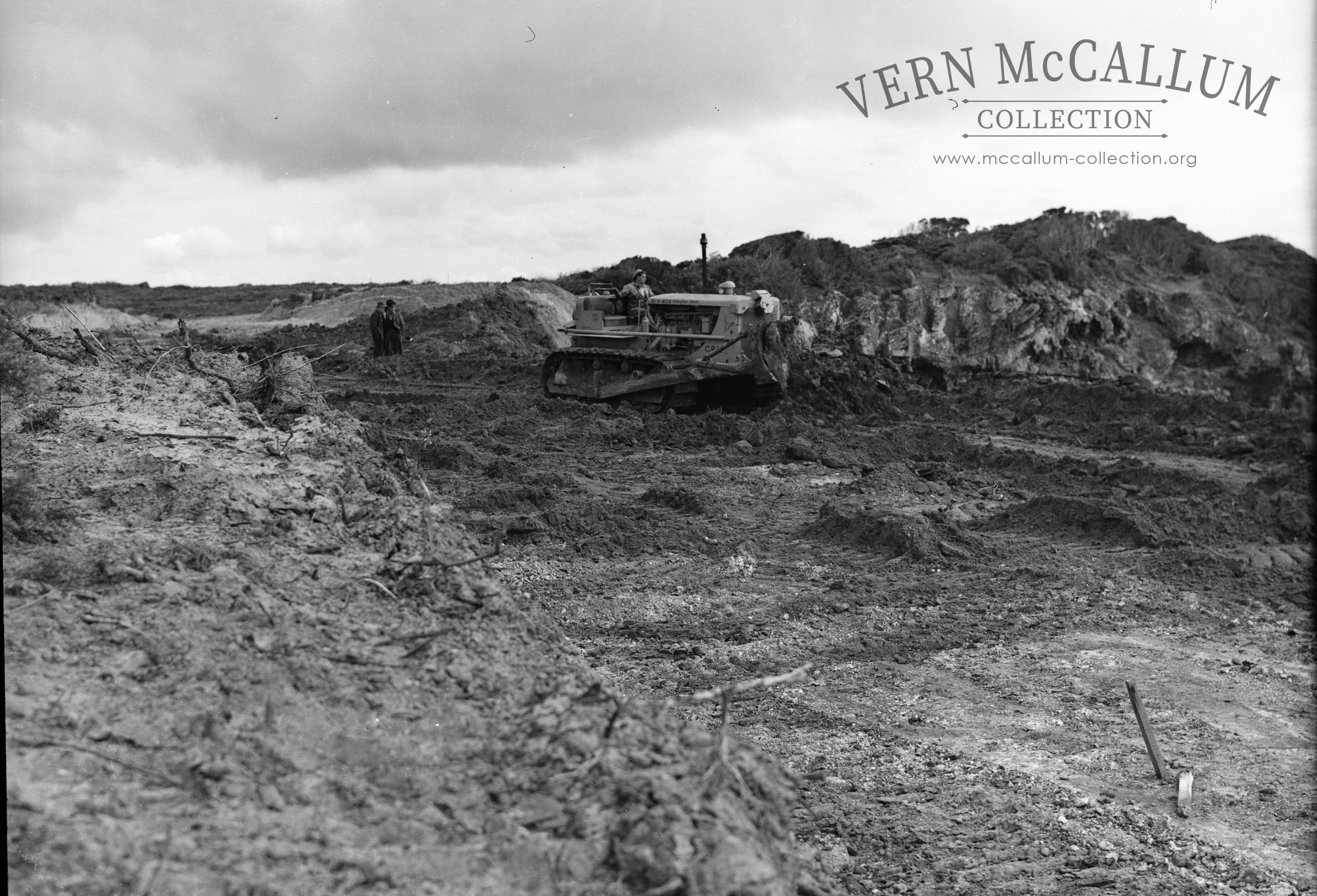 Constructing quarry road. the writing on the side is 31-W-Catapillar Diesel
