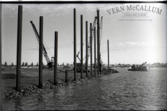 Driving piles for new wharf, Portland.