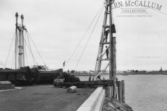 Construction of port area, Portland. Driving timber piles for the Pilots landing.