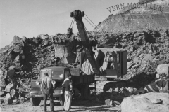 A Rapier Shovel loading  a truck with rock at Cape Grant for works of the new port area, Portland. Circa 1954.