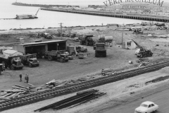 Watsons workshop and the Euclid trucks used to transport the rock for the new port area, Portland.
