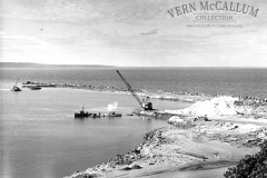 Main Break water construction dredging sand to reclaim land 
photo courtesy of Geoff Blackman.