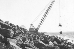 Main Break water construction   placing rocks on the K S Anderson Wharf
photo courtesy of Geoff Blackman.