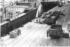 Trade bagged flour and rice laoding from the ocean pier
photo courtesy of Geoff Blackman