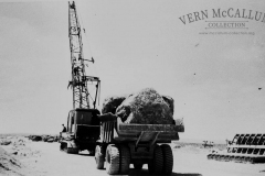 .Construction of the K S Anderson wharf .The rocks were placed with the grab on the  Osgood crane.Note the size of the stone .