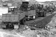 Loading truck at unknown quarry.