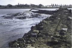 Jorgens dredge pumping sand and rubble for reclamation works.
