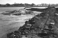 Jorgens dredge pumping sand and rubble for reclamation works.