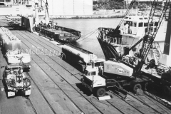 Oil rig tender boats being refuelled and loaded at the K S Anderson wharf.