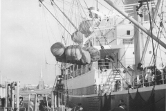 Loading wool at old ocean pier.