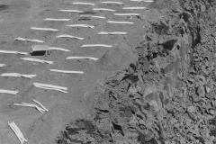 Loading holes for a blast.