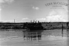 An International TD 24 dozer at work  at the Portland harbour. Circa 1950.
 scanned From a glass negative.