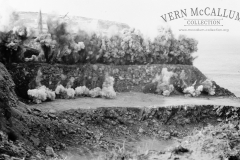 Blasting the face at Cape Grant for more rock to be used in building the Port of Portland.
Scanned from a glass negative.