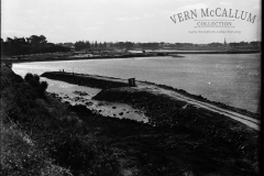 A view of the bay taken from below Battery Point at the start of building the Port, circa 1950.
This photo is done from a glass negative.