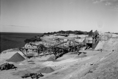 The crushing plant complete the magazine for the explosives can be seen behind the utility.