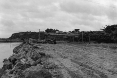 Reclaiming swamp for the railway line.