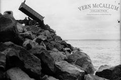 Dumping rock on the main breakwater.