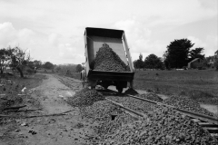 Placing the ballast on the railway line.