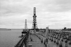 Construction of the K S Anderson wharf note the rail lines that the pile driver travels along during construction.