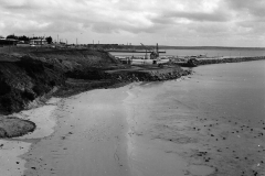 Looking at he K S Anderson wharf from the Lady Bay beach.