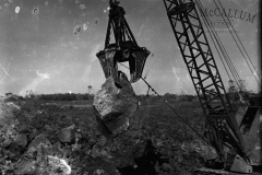 Moving a large stone with the grab.