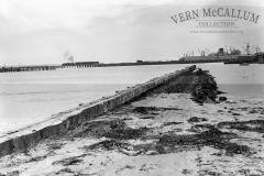 Constructing the groyne later the trawler wharf note the train on the railway pier.