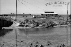 Construction of the store building.Note the hut in the left side of this photo.
