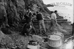 Setting up to drill for a blast part way up the rock face at Blacknose quarry.