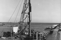 A pile driver at work on the pier at Portland