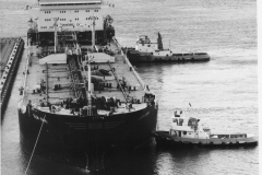 A ship tying  up to No. 5 berth.